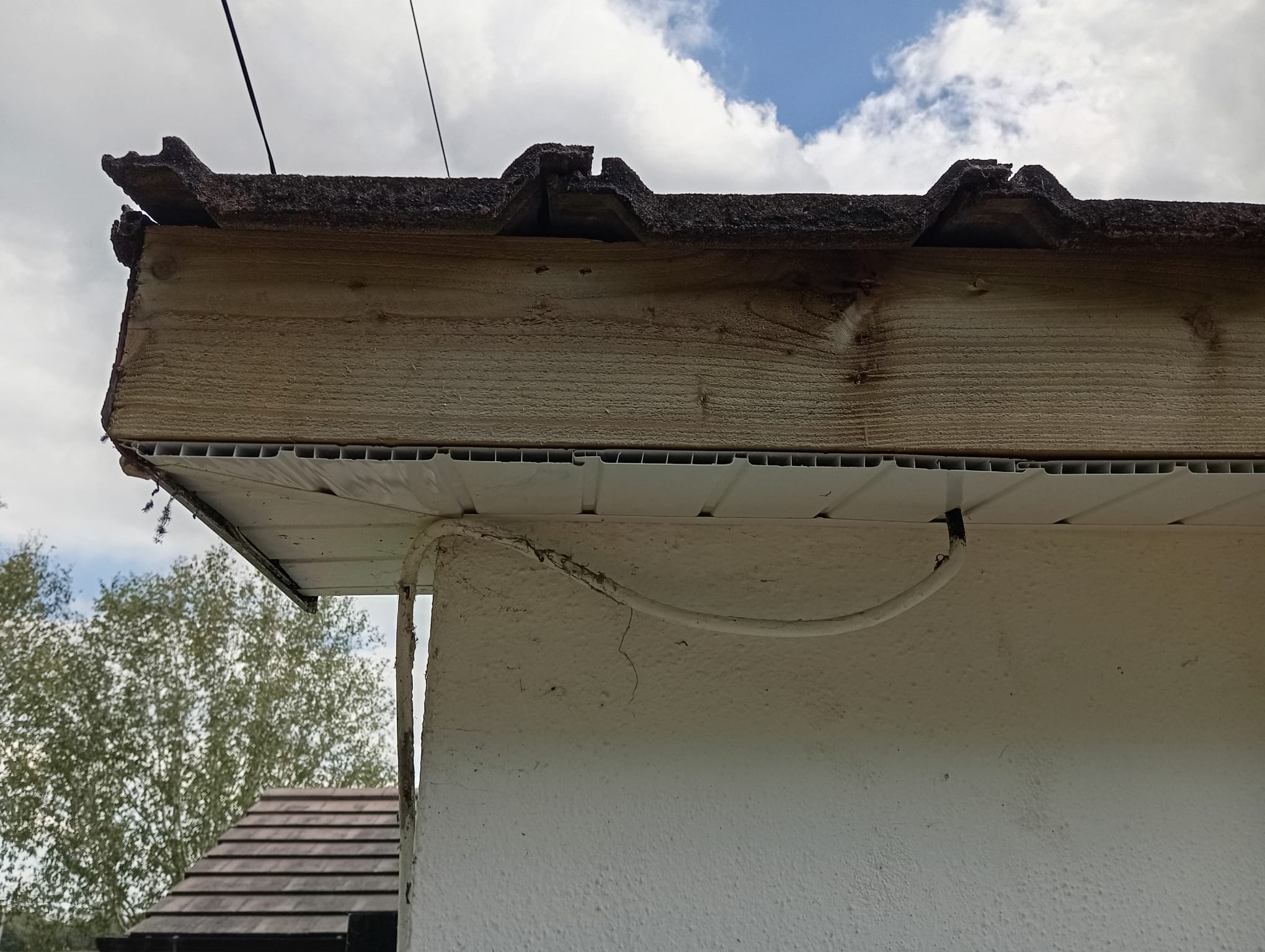 Blocked and overflowing gutters trapped water behind the wood, causing severe rot. We stripped back all affected areas and removed the rotted timber.